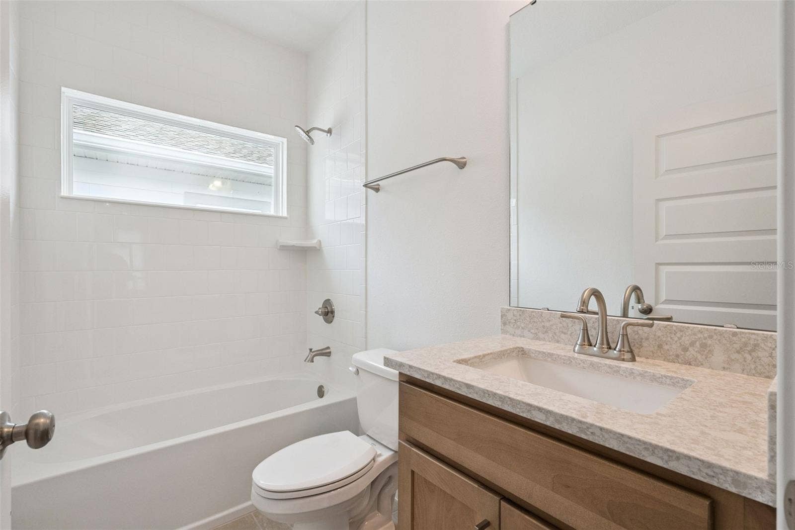 17602 JAPONICA BLOOM DRIVE, Winter Garden, FL 34787 Representative photo secondary bathroom
