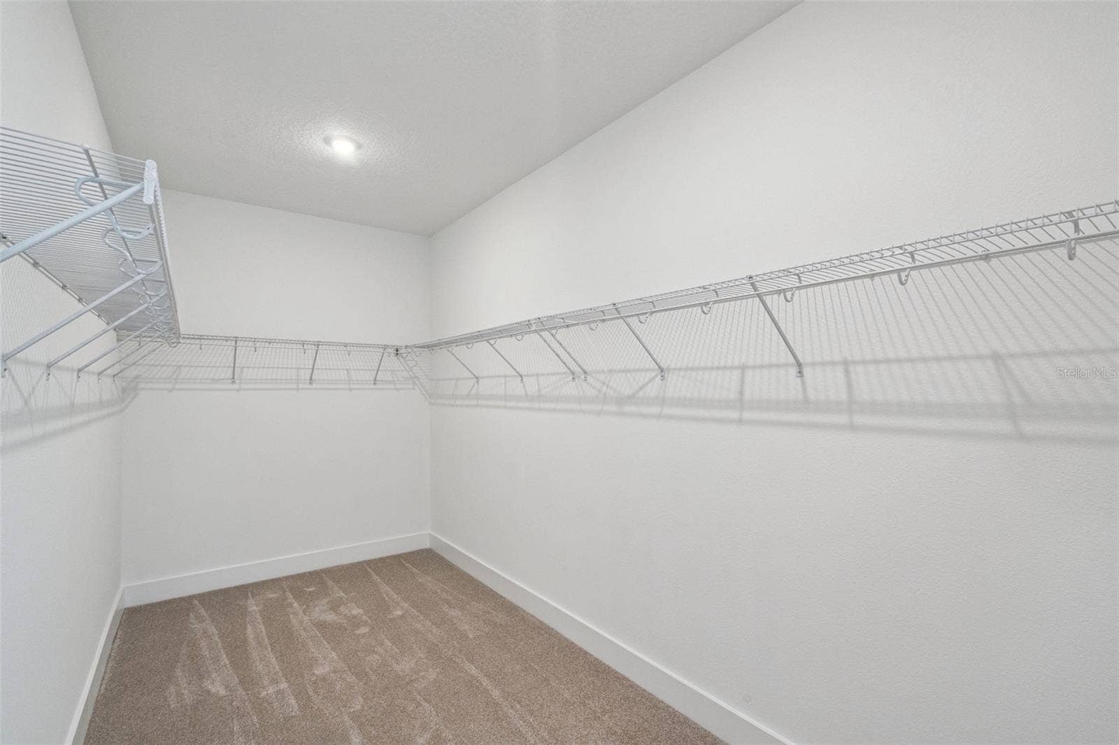17602 JAPONICA BLOOM DRIVE, Winter Garden, FL 34787 Representative photo primary closet