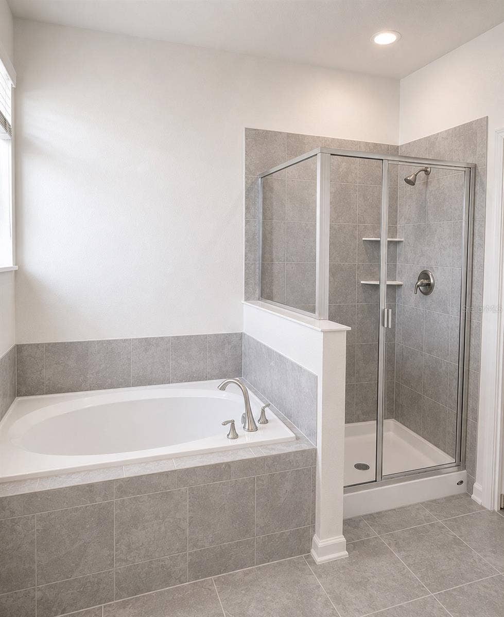 Primary Bathroom  Shower and Tub