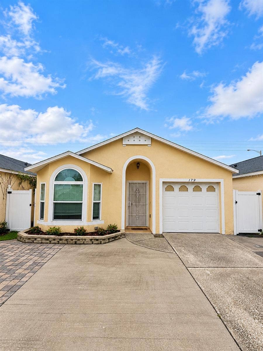 Property photo for 179 DAHLIA VILLAGE CIRCLE, #63, Orlando, FL