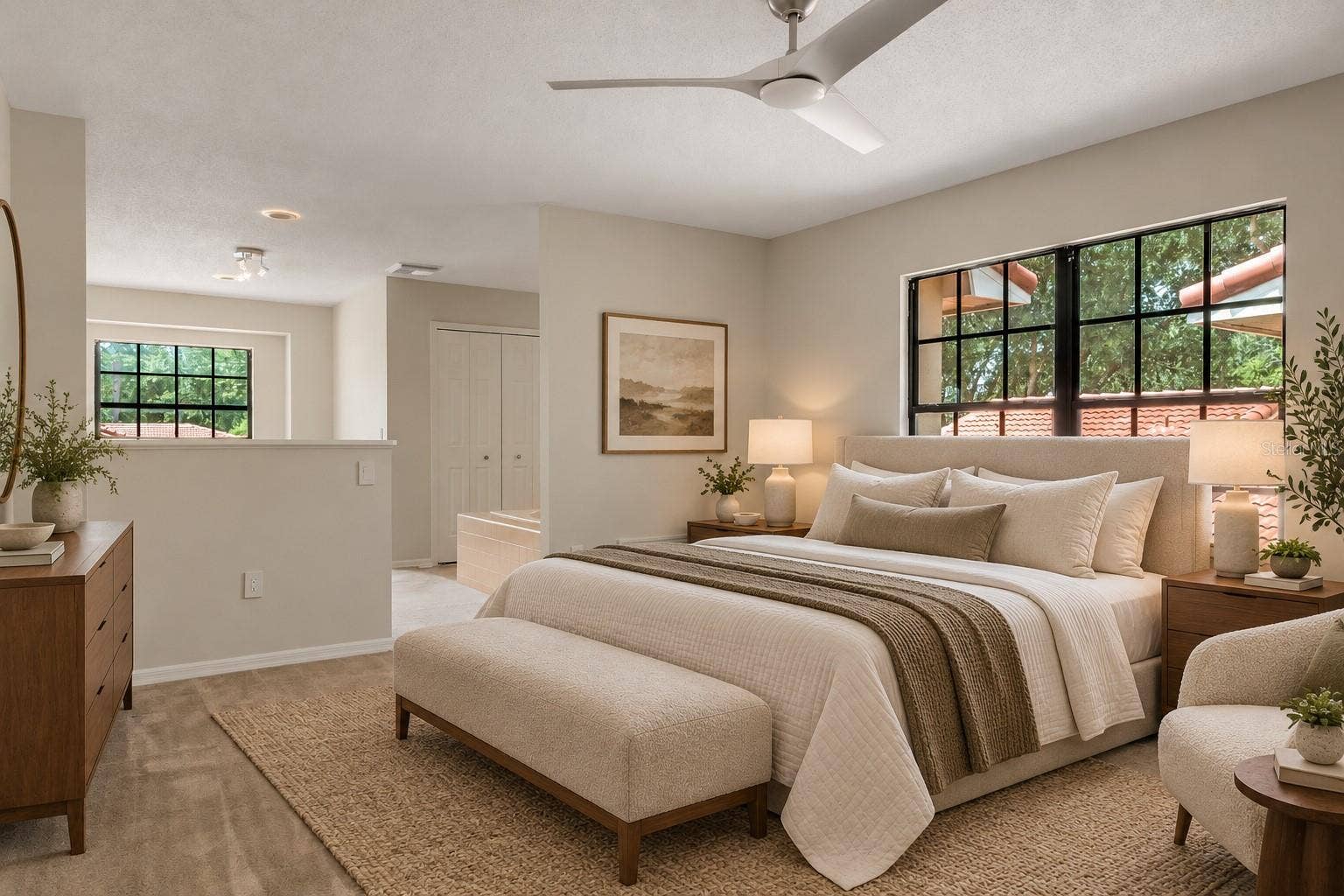 8235 AMBROSE COVE WAY, Orlando, FL 32819 Spacious primary bedroom with room for additional seating