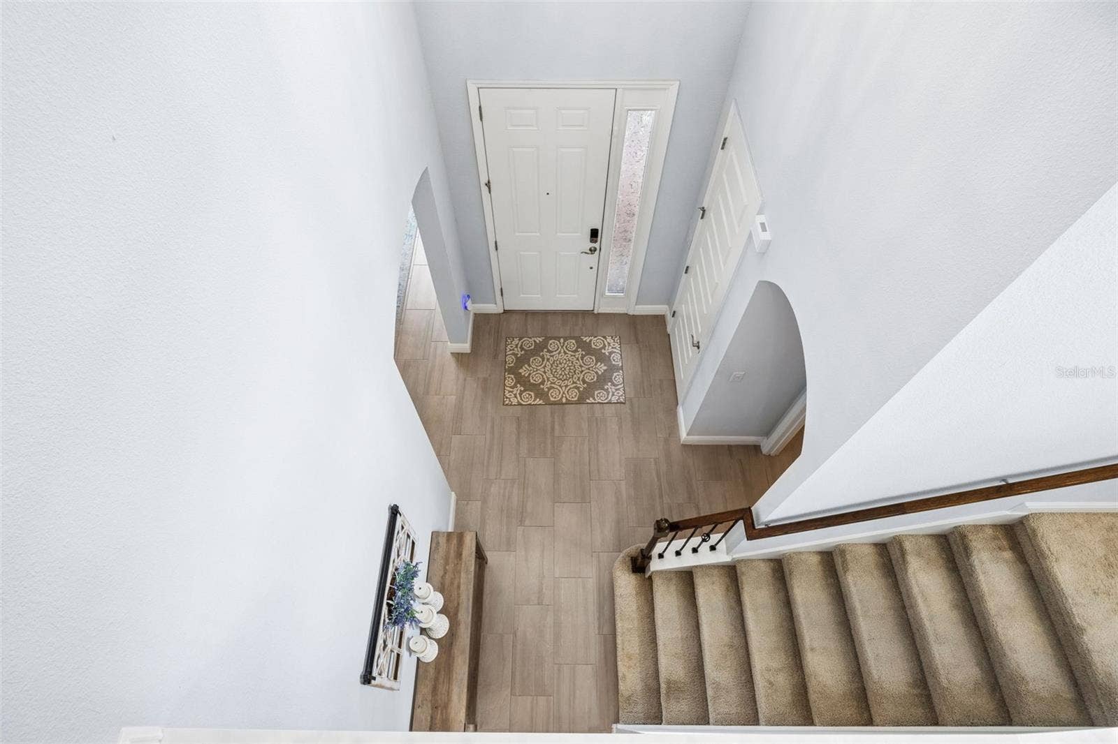 10048 BEACH PORT DRIVE, Winter Garden, FL 34787 Two story Foyer - Stairs with Wrought Inron Railing