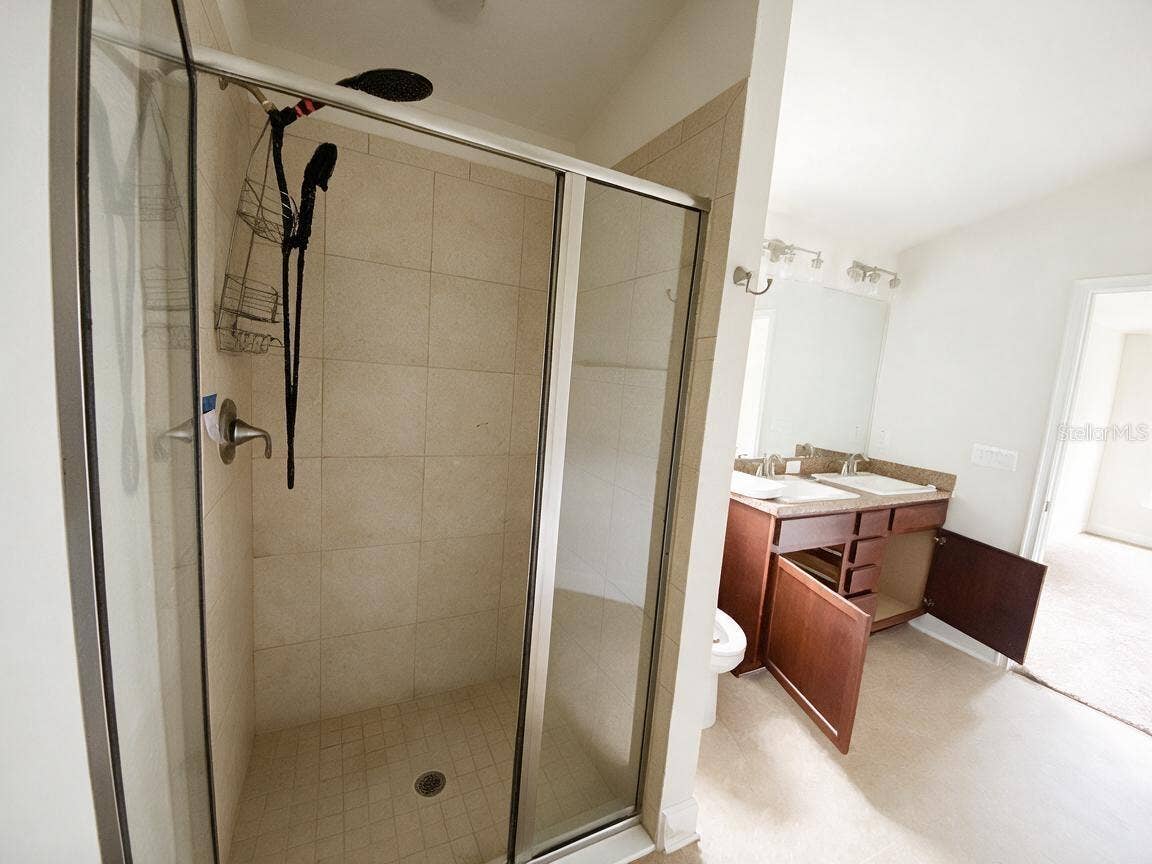 Primary En-suite with Double Sink, Shower and Soaking Tub.