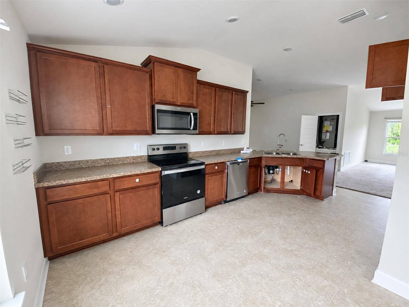 View of Kitchen Cabinets and Peninsula.