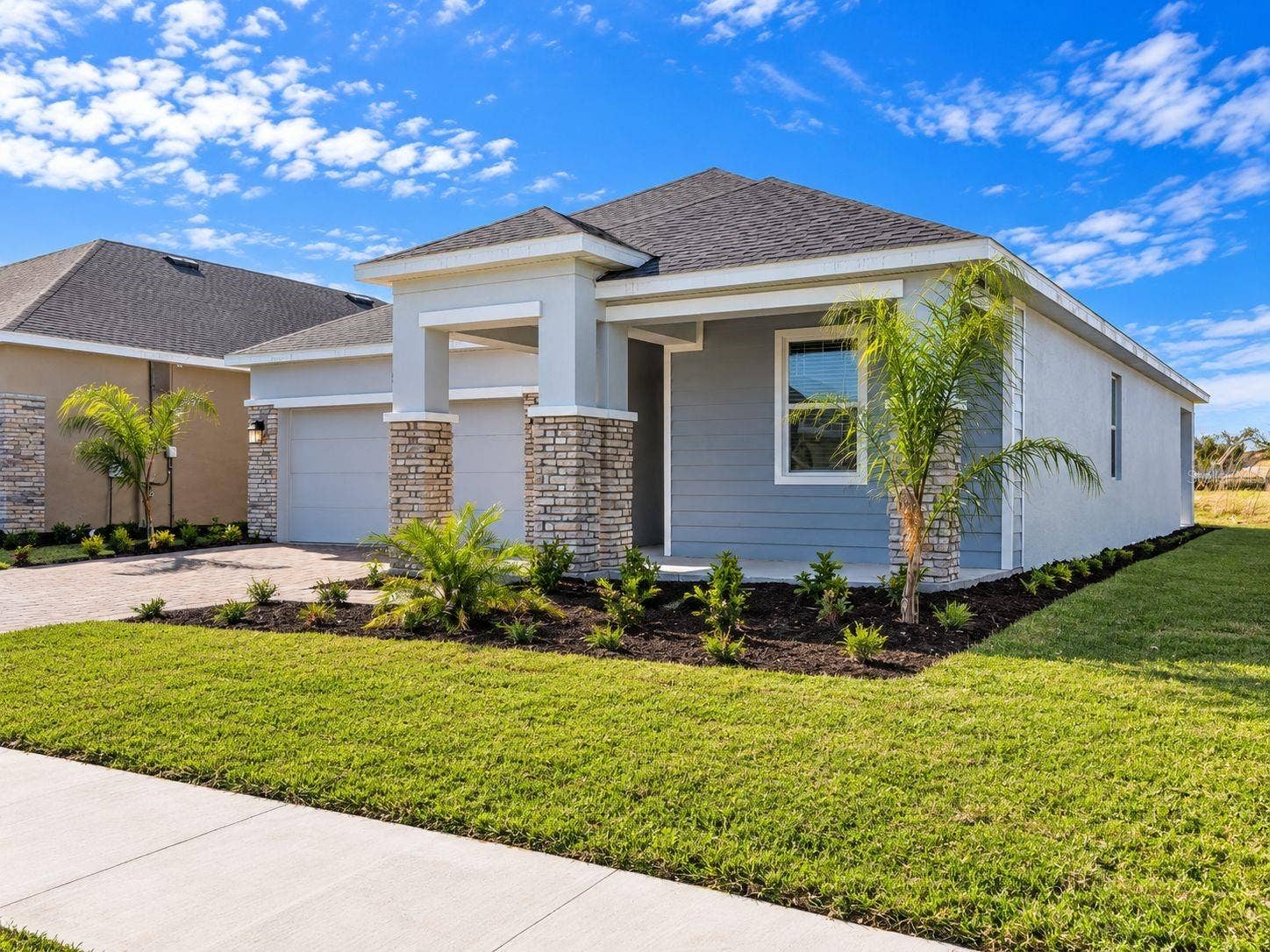 148 ACES HIGH LANE, Davenport, FL 33896 Exterior Side View