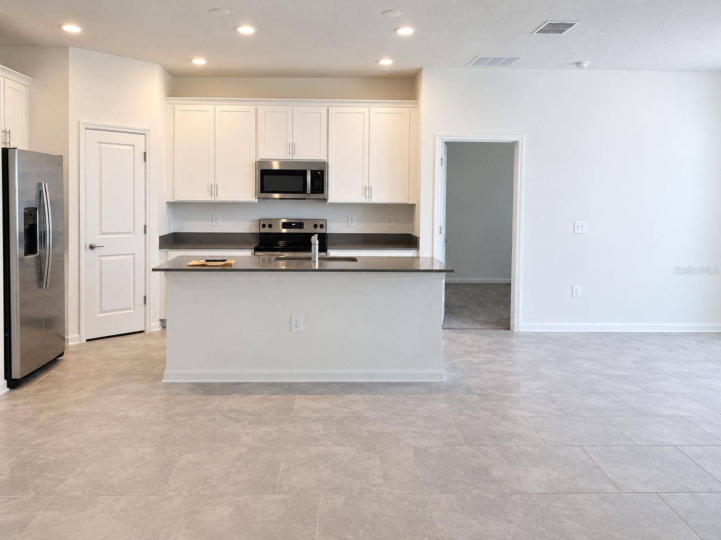 148 ACES HIGH LANE, Davenport, FL 33896 Kitchen and Dining Area