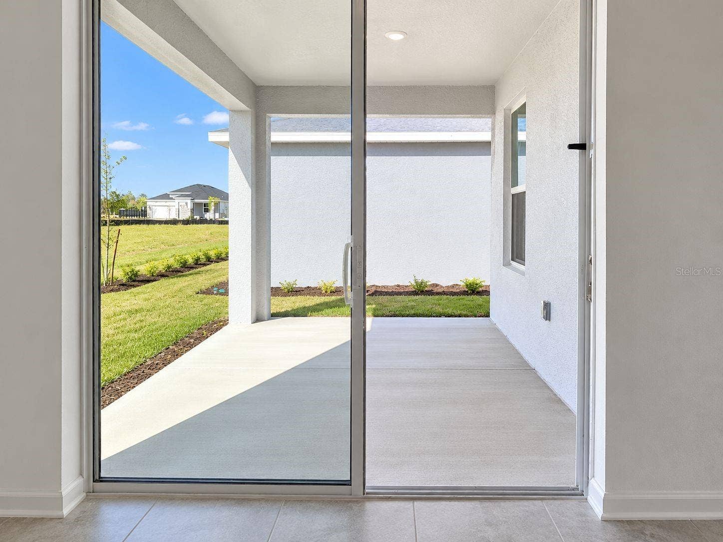 148 ACES HIGH LANE, Davenport, FL 33896 Covered Rear Patio