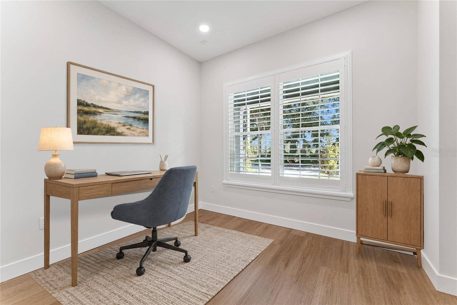 3456 FAIRWAY LANE, Orlando, FL 32804 Virtually Staged - Paired shuttered windows bring natural light into this first floor office.