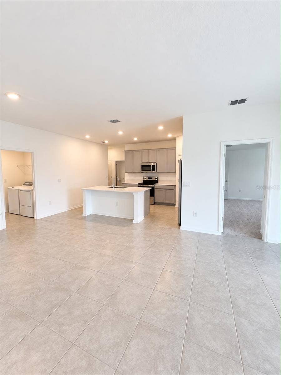 285 PINEYWOODS STREET, St Cloud, FL 34772 Living and Kitchen Alternate