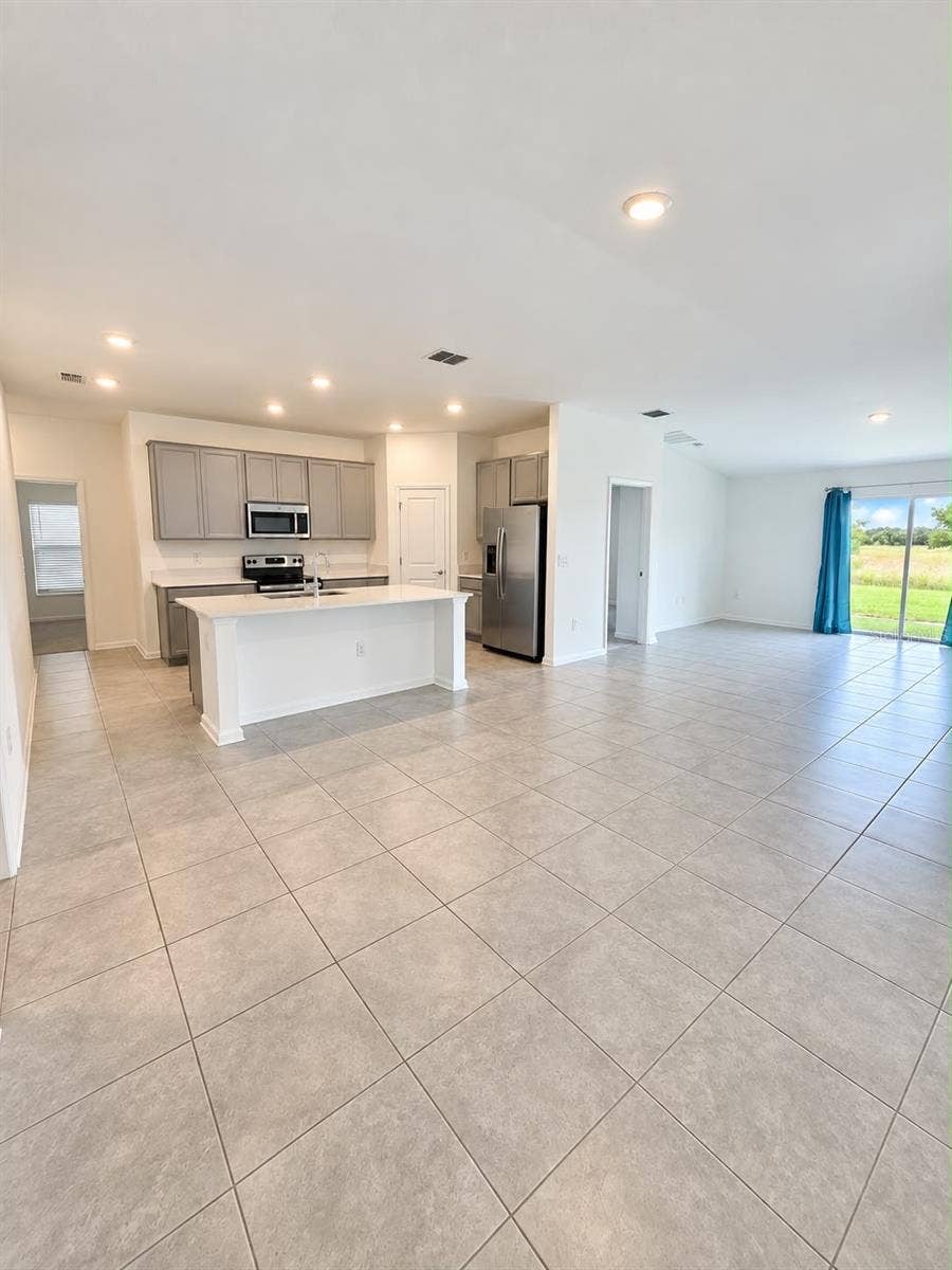 285 PINEYWOODS STREET, St Cloud, FL 34772 Open Concept Living and Kitchen