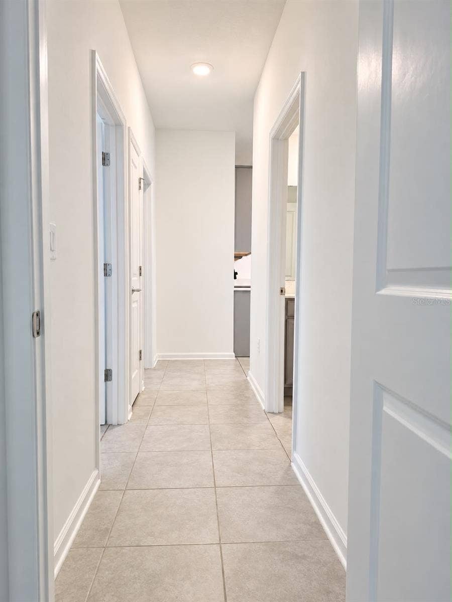 285 PINEYWOODS STREET, St Cloud, FL 34772 Interior Hallway 01