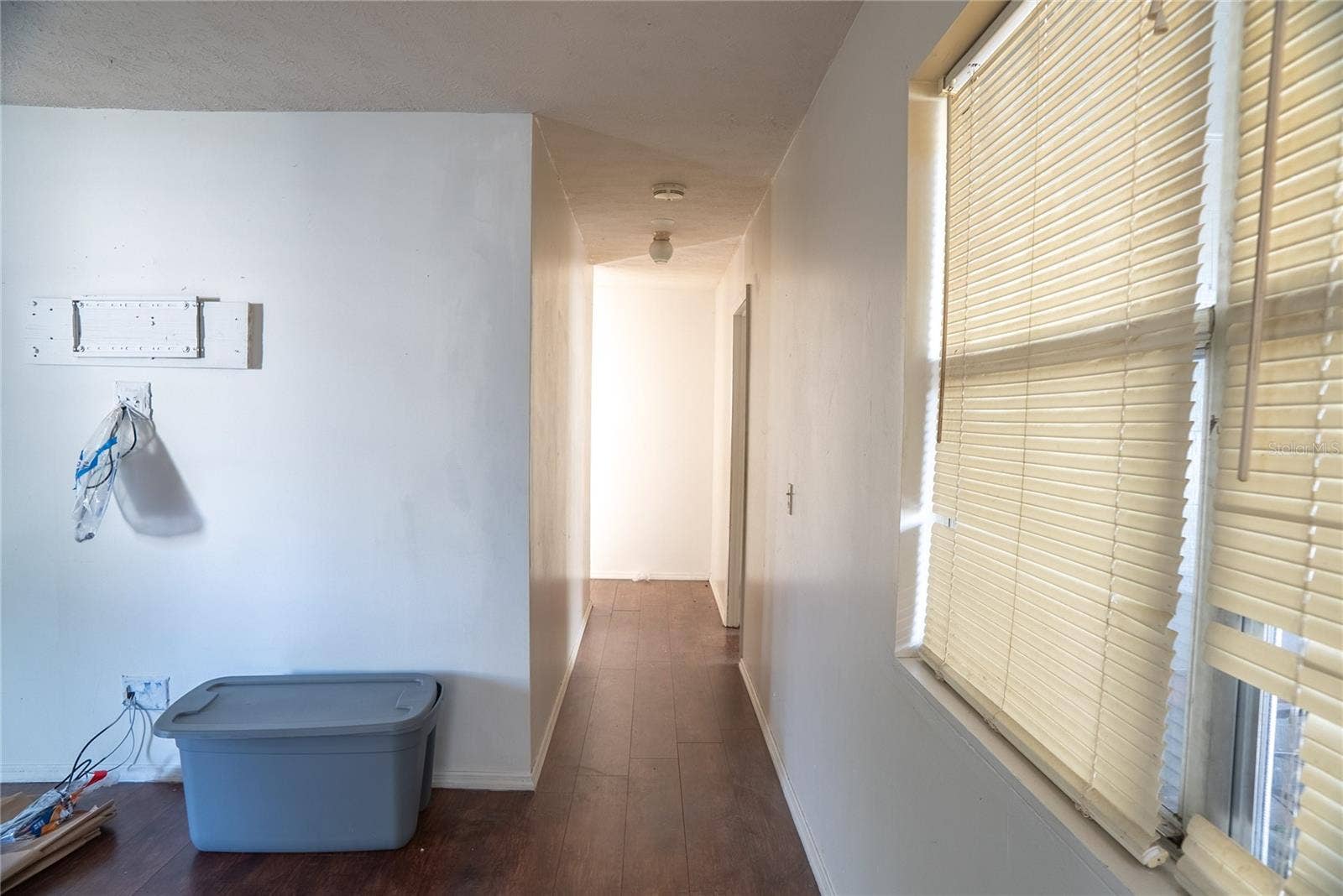 Hallway to primary bedroom