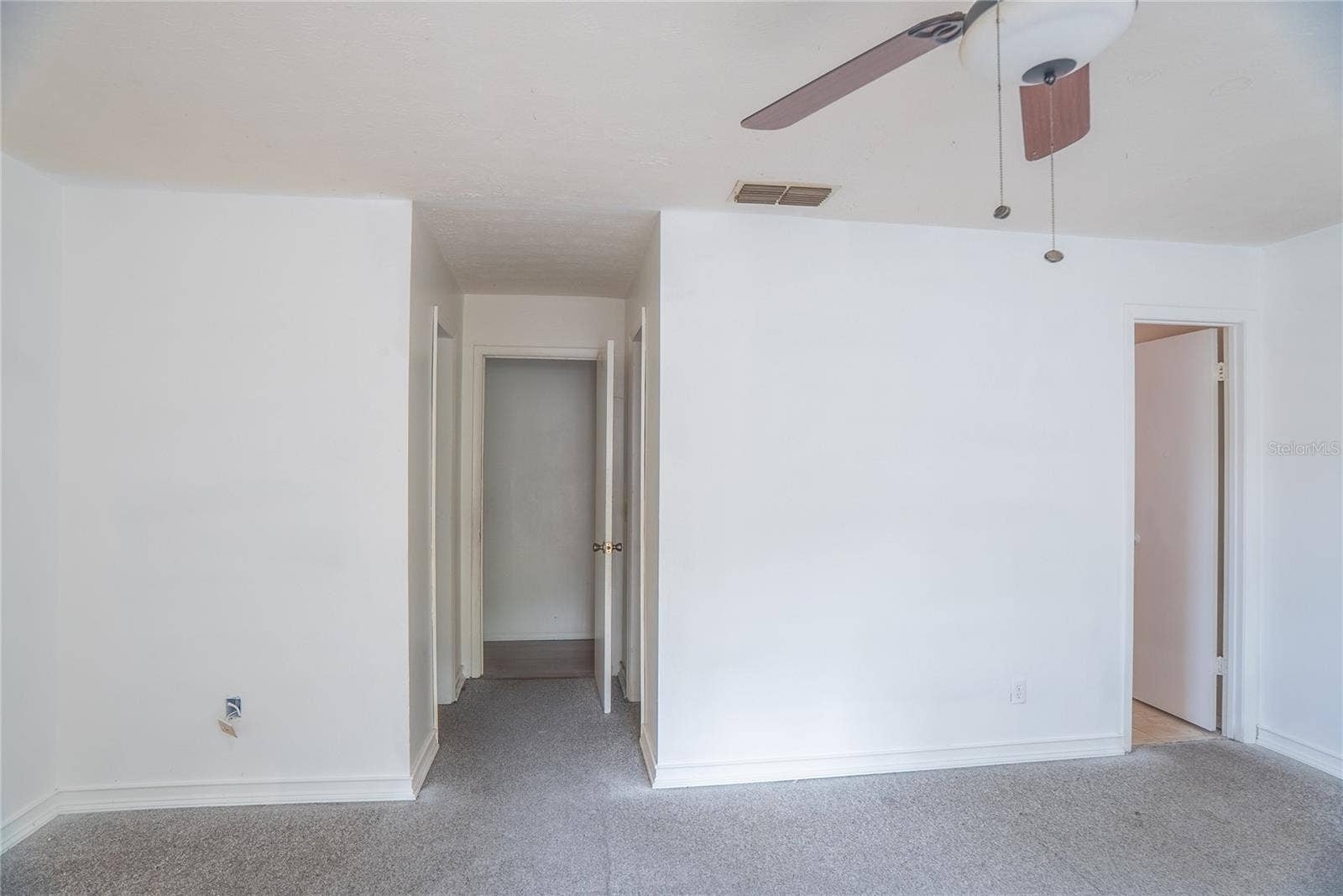 Dual Closets and Ensuite bathroom with shower in primary bedroom