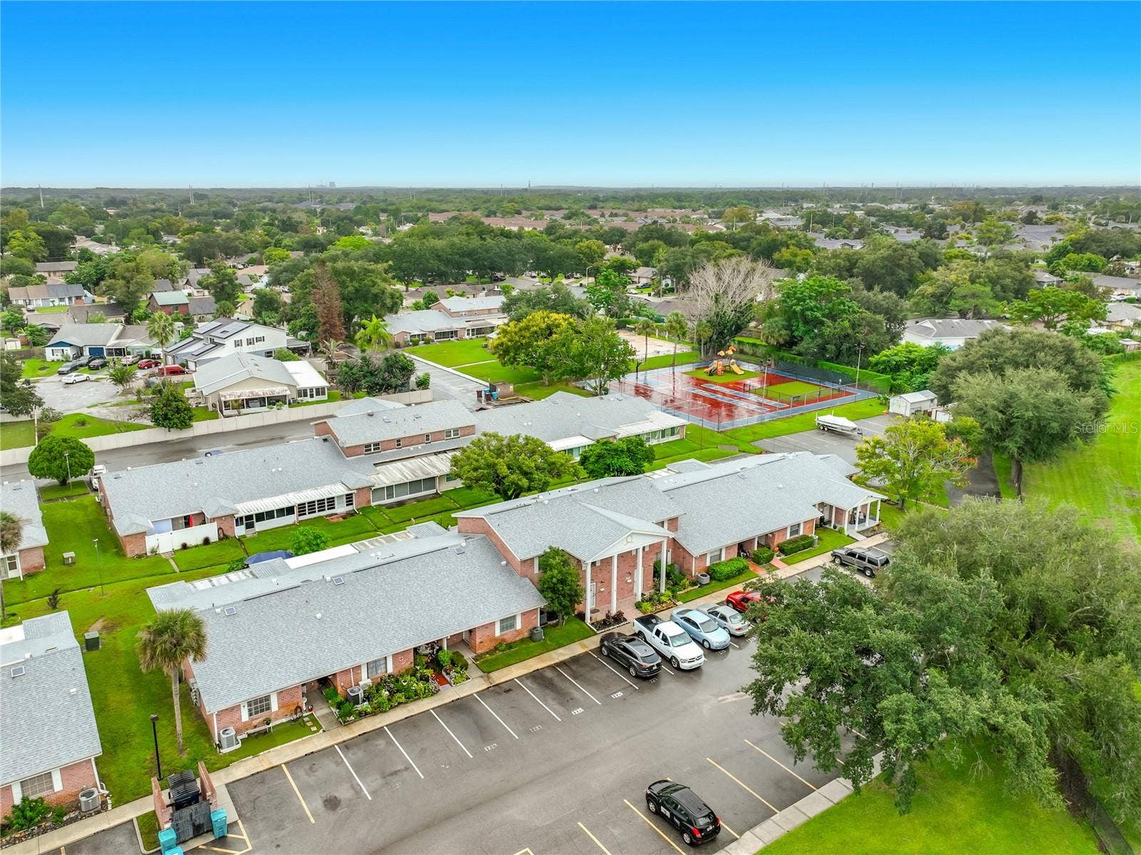 1225 CARRIAGE LANE, #1, Orlando, FL 32807 Aerial view of Candlewyck East and the surrounding Orlando area.
