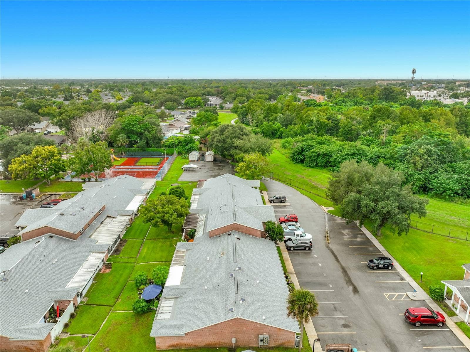 1225 CARRIAGE LANE, #1, Orlando, FL 32807 Aerial view showcasing the Candlewyck East community and surrounding area.