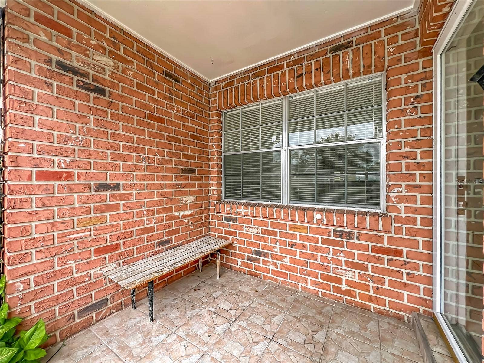 1225 CARRIAGE LANE, #1, Orlando, FL 32807 Private covered front entry welcomes you home.