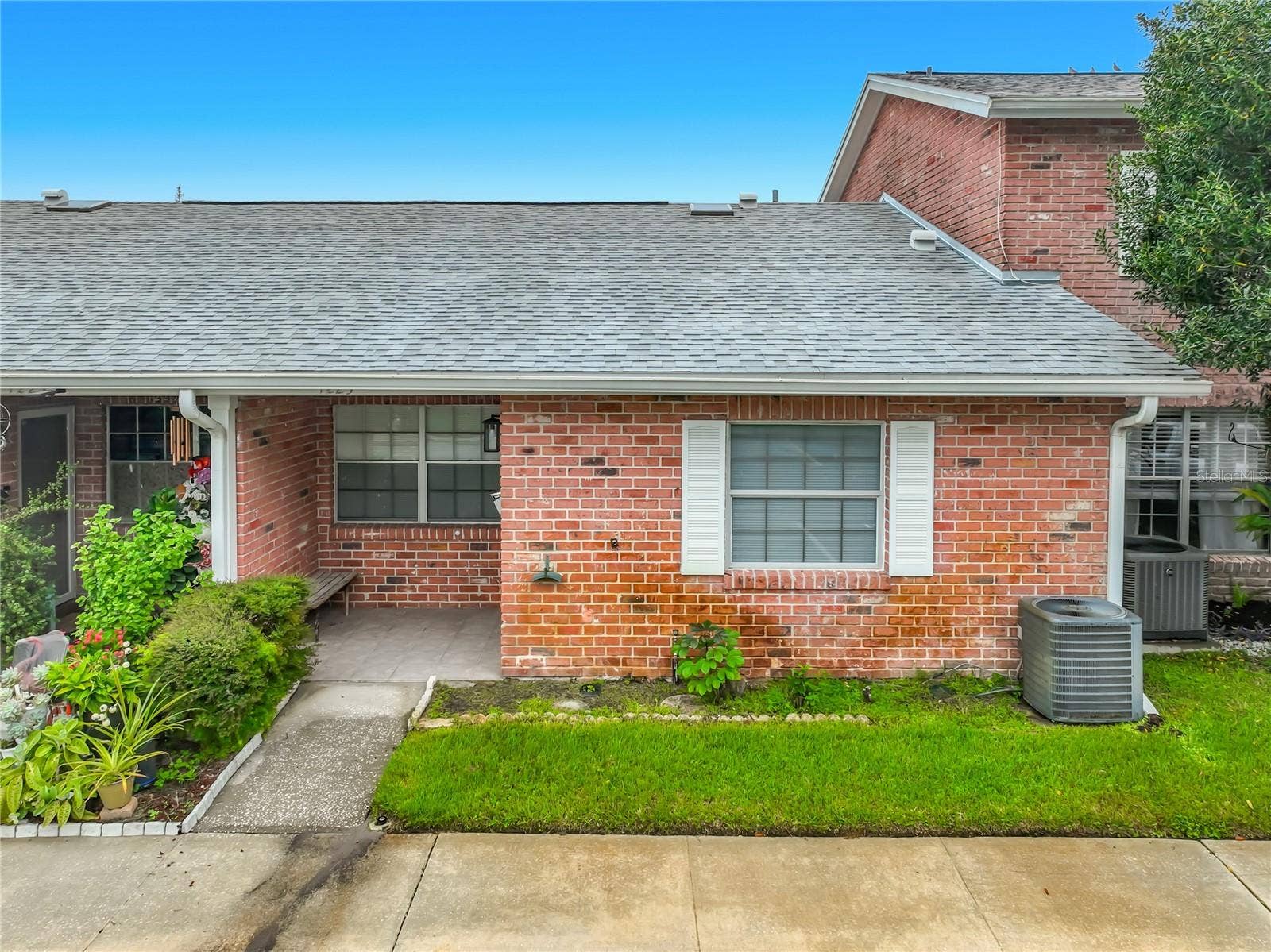 1225 CARRIAGE LANE, #1, Orlando, FL 32807 Charming one-story home offering 2 bedrooms, 2 full bathrooms and a spacious layout.