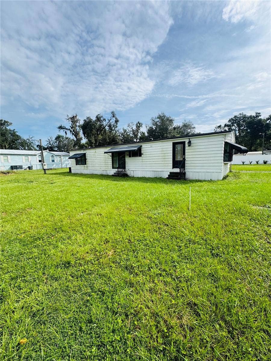 1013 LIANNE PLACE, Seffner, FL 33584 Front exterior/yard view
