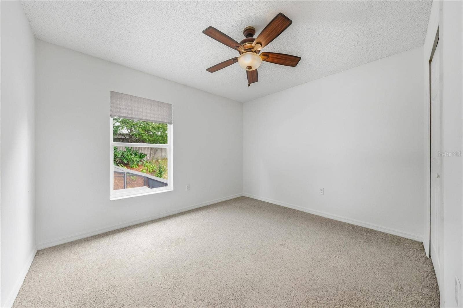 Bedroom 3 Upstairs looks onto Pool