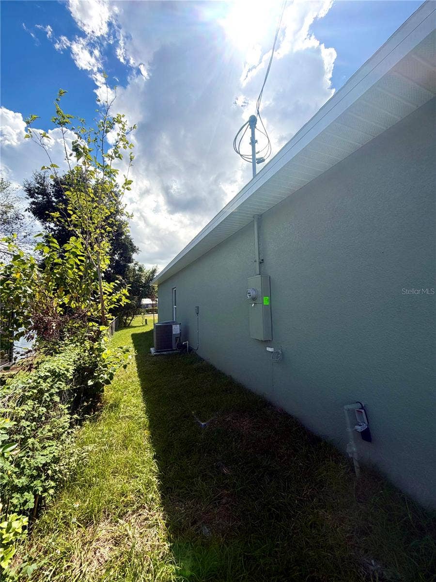 1205 AVENUE K, Haines City, FL 33844 left side