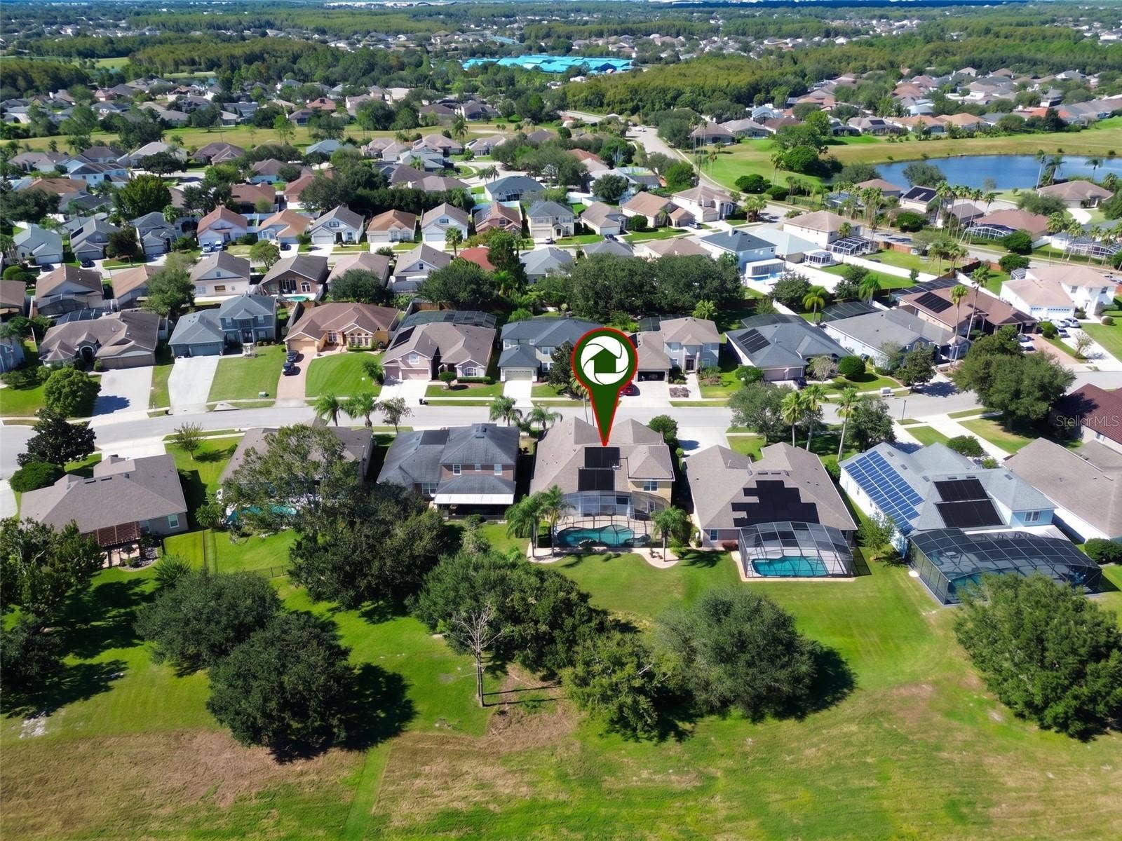 BEAUTIFUL AERIAL VIEW OF THIS STUNNING POOL HOME NESTLED ON A QUIET CUL-DE-SAC IN THE HIGHLY DESIRABLE GATED COMMUNITY OF EASTWOOD!
