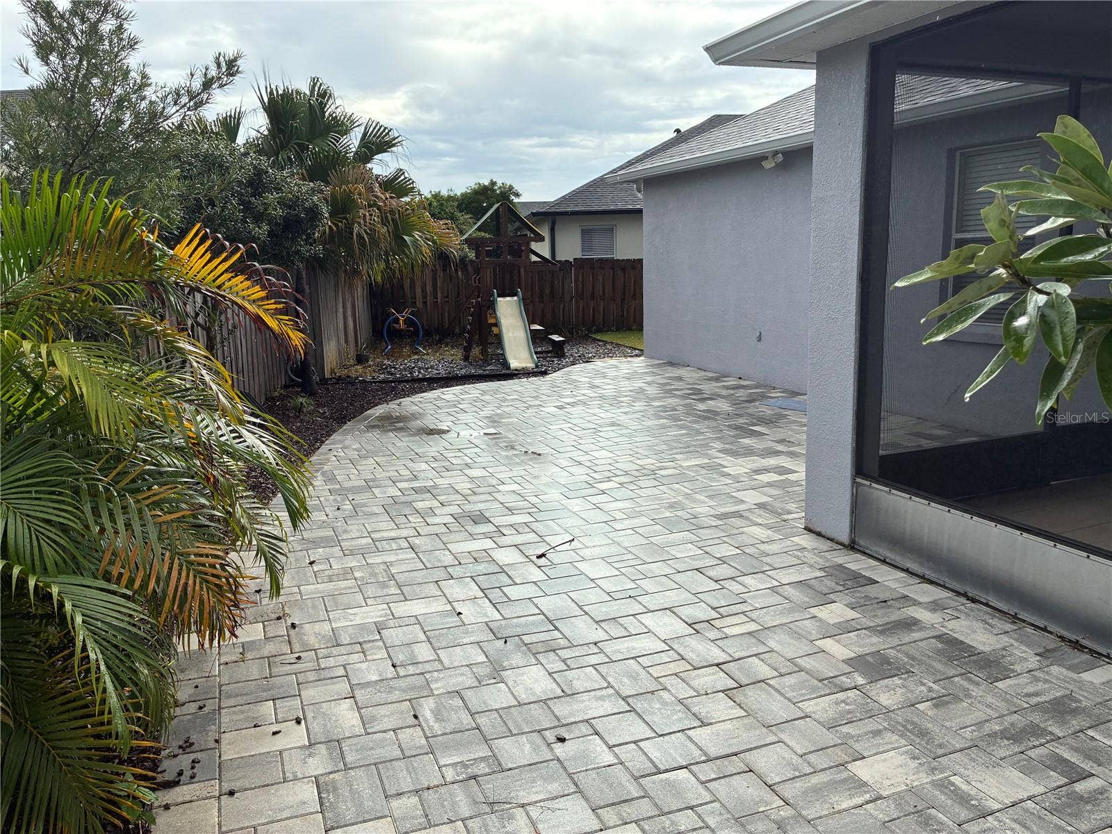 14212 SUNRIVER AVENUE, Orlando, FL 32828 Rear Porch and backyard pavers