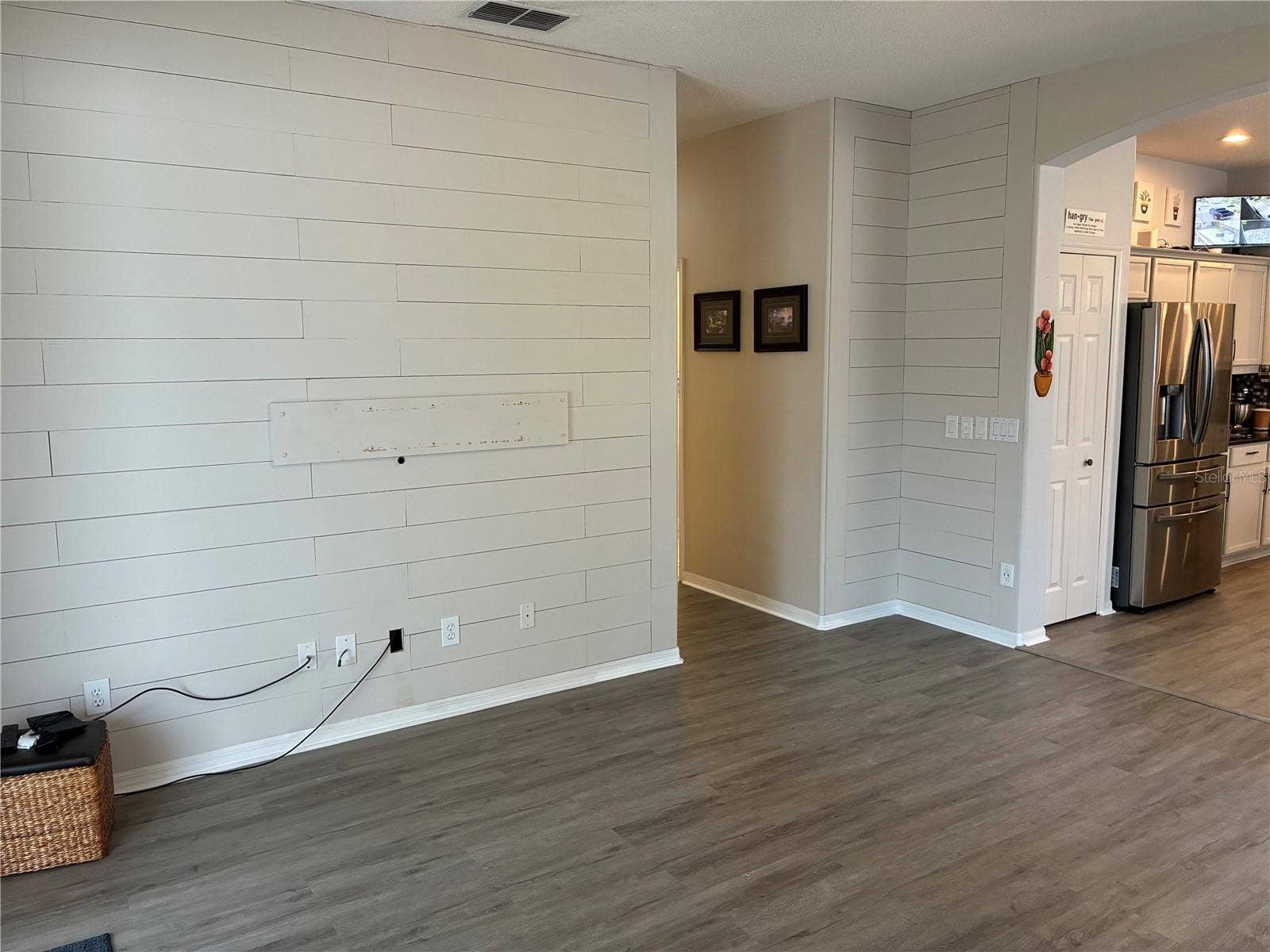 14212 SUNRIVER AVENUE, Orlando, FL 32828 Livingroom w/ hall to bedrooms