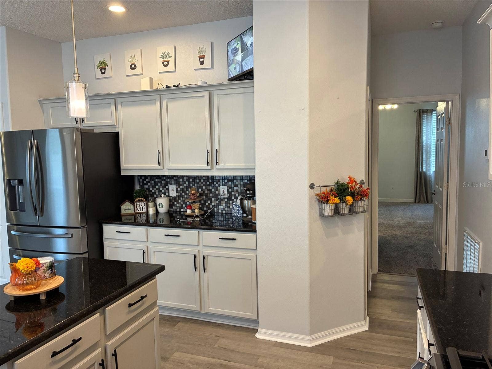 14212 SUNRIVER AVENUE, Orlando, FL 32828 Kitchen and hall to master