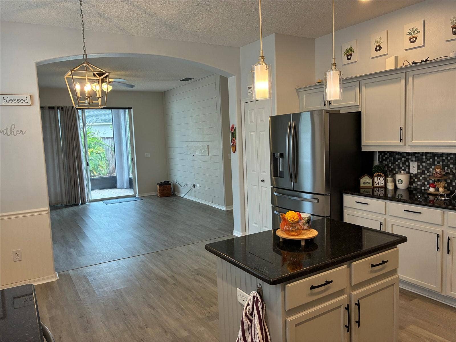 14212 SUNRIVER AVENUE, Orlando, FL 32828 Kitchen w/ Living in background