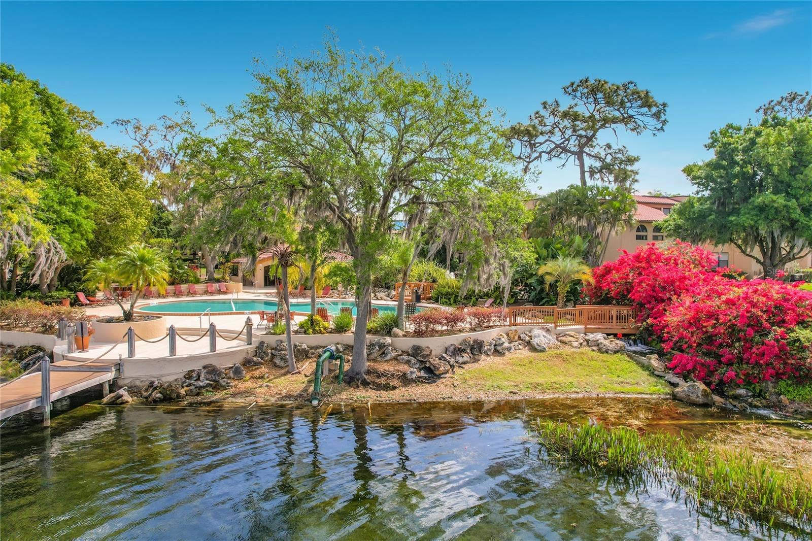 1275 SAINT TROPEZ CIRCLE, #1275, Orlando, FL 32806 View of pool from Lake