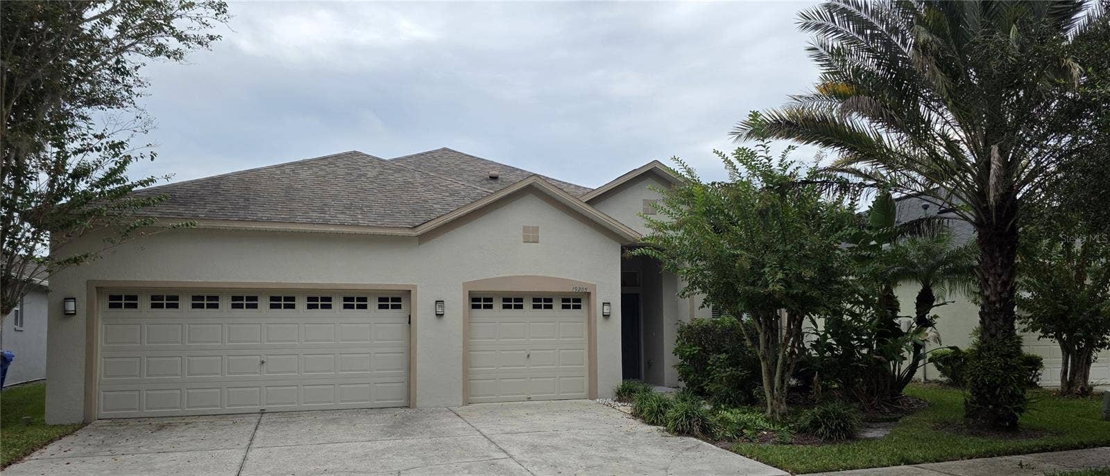 Front including 3 car garage