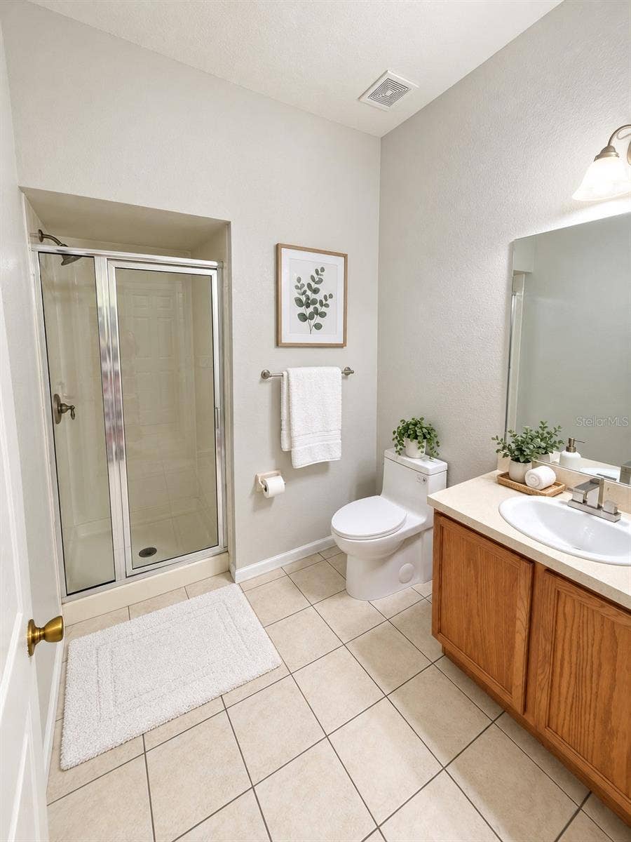 4996 TOWN TERRACE N, Kissimmee, FL 34758 Guest Bathroom virtual staging