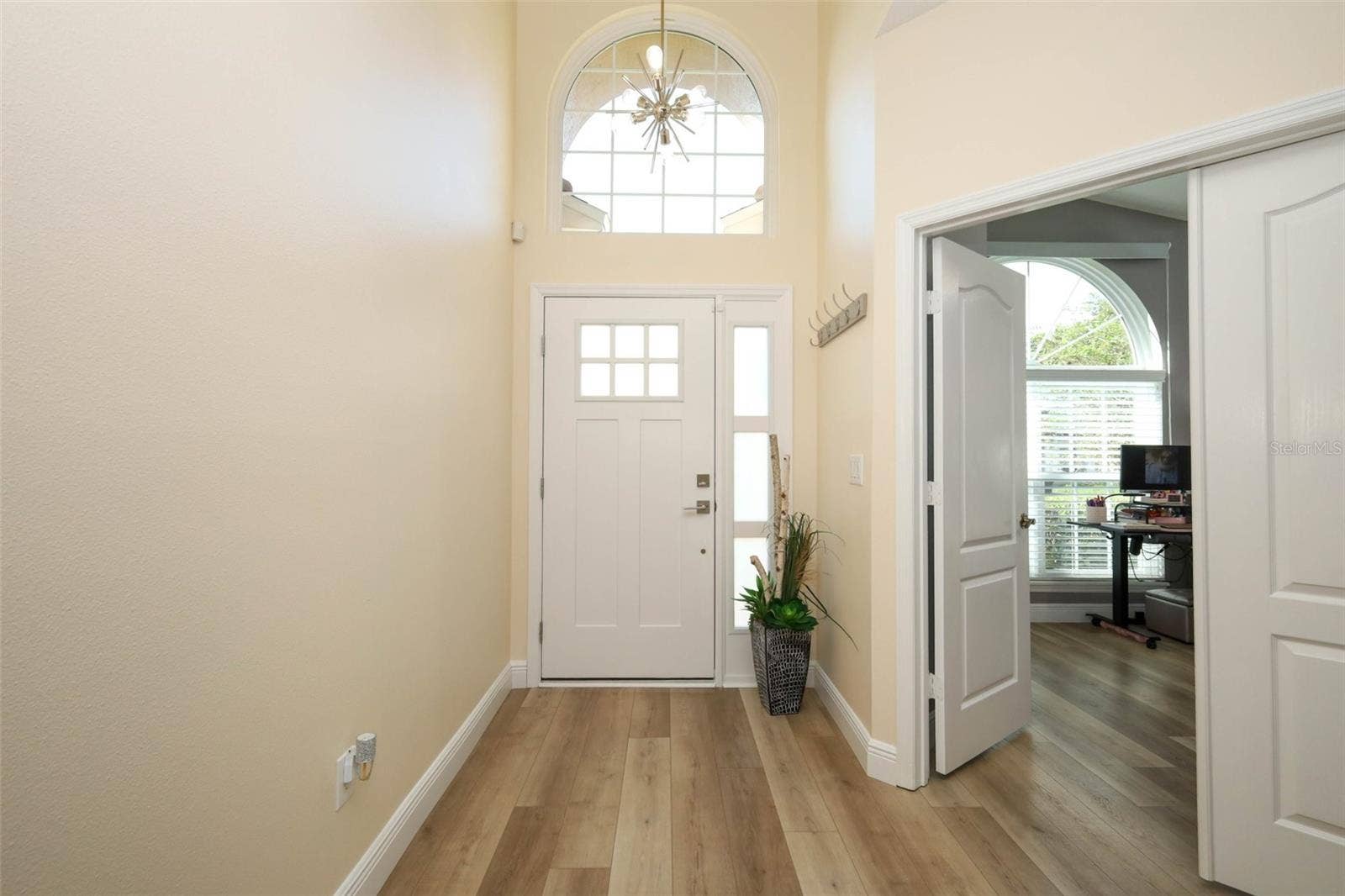 Foyer with 4th bedroom off to left as you walk in.  CURRENTLY BEING USED AS OFFICE!!!