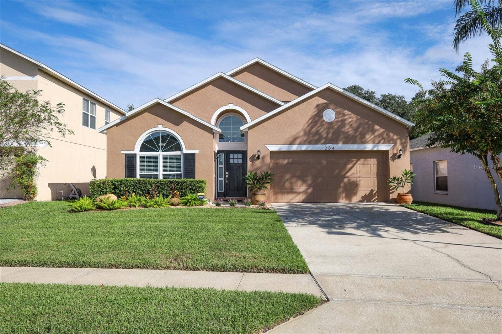 Mature landscaping.  new exterior paint and updated double paned windows