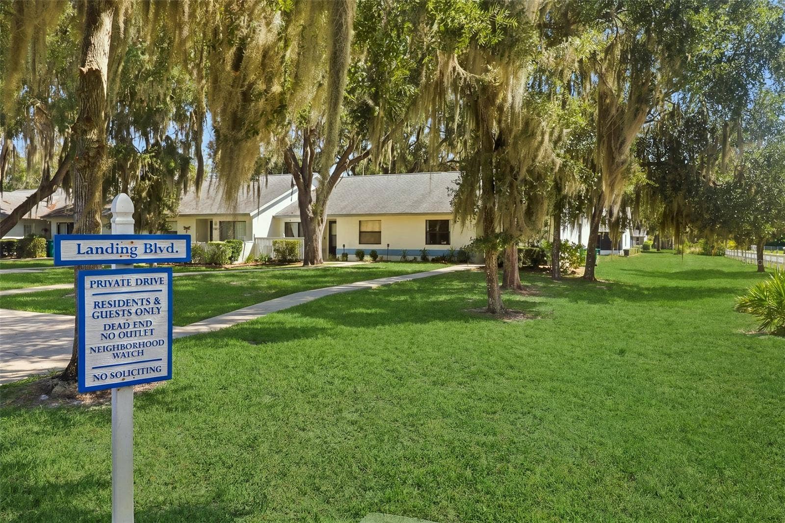 480 LANDING BOULEVARD, Inverness, FL 34450 View of community signage and lot view when entering neighborhood