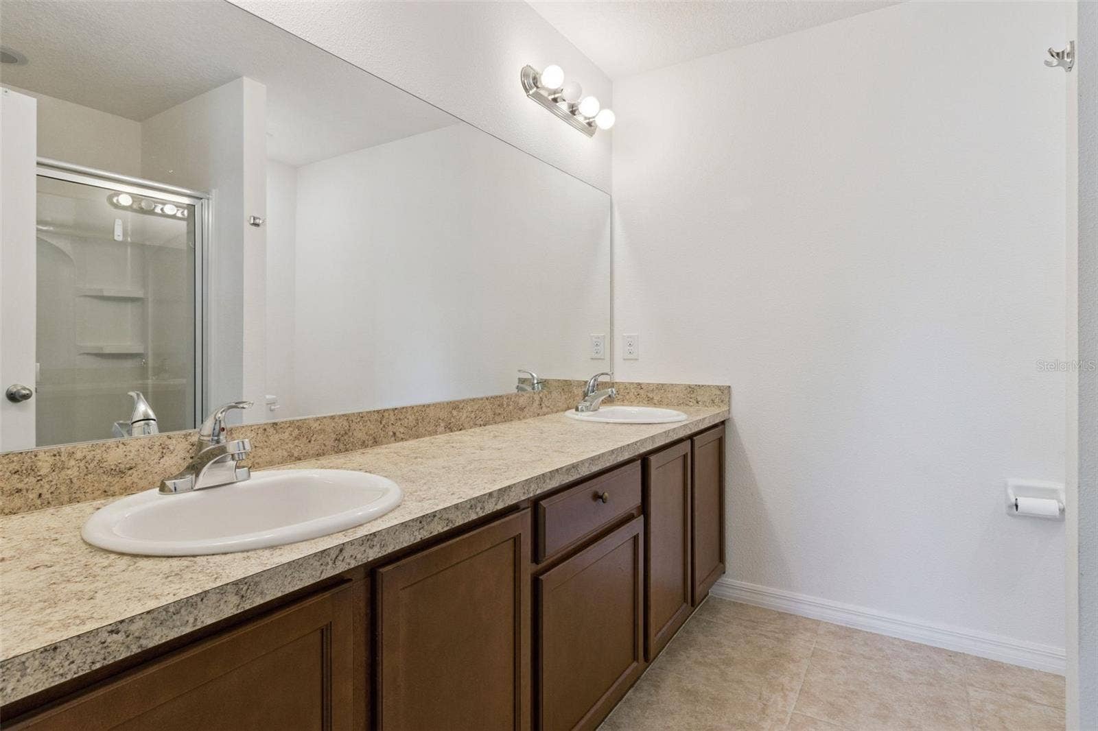 5771 LACAR WAY, Lakeland, FL 33805 primary bath with walk in shower