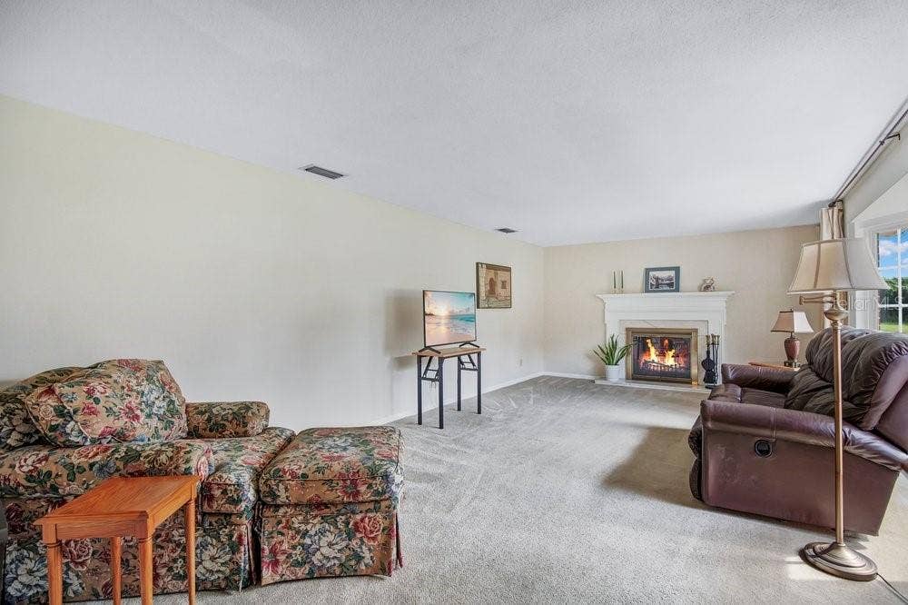 109 PINE NEEDLE LANE, Altamonte Springs, FL 32714 Formal Living Room with Fireplace