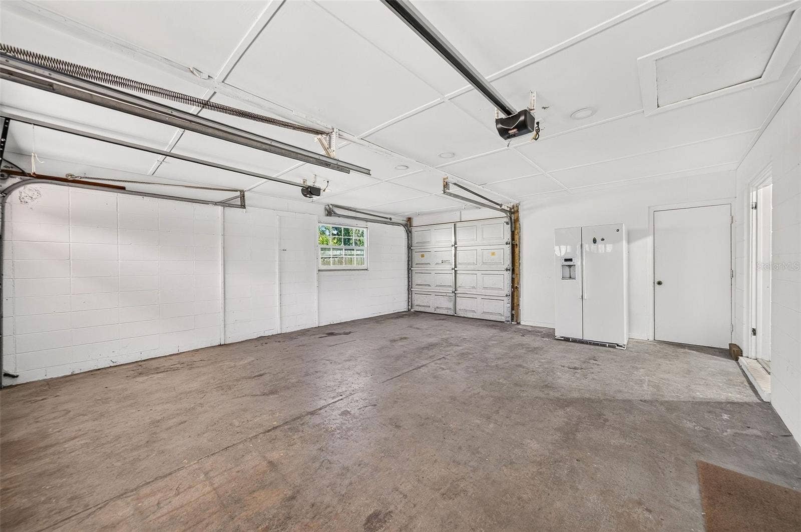 641 SHERWOOD DRIVE, Altamonte Springs, FL 32701 3rd garage door - leads to backyard