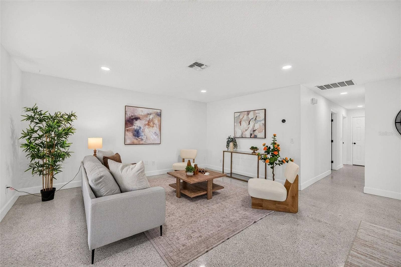 641 SHERWOOD DRIVE, Altamonte Springs, FL 32701 Living room with hallway to 3 bedrooms