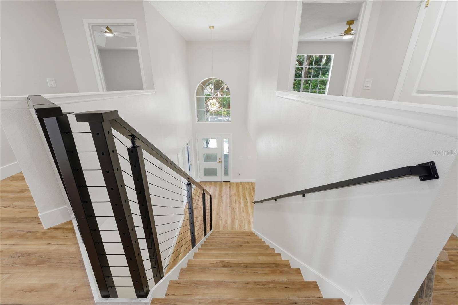 13044 BELLERIVE LANE, Orlando, FL 32828 Abundance of natural lighting, creating a bright, warm, and inviting atmosphere