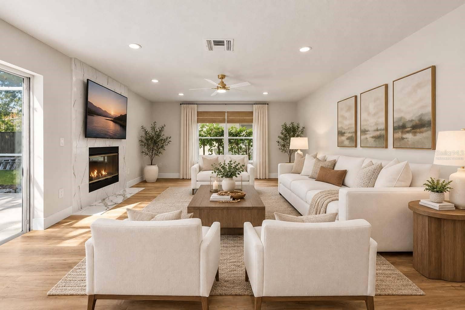 13044 BELLERIVE LANE, Orlando, FL 32828 Virtually Staged Family room to show layout potential