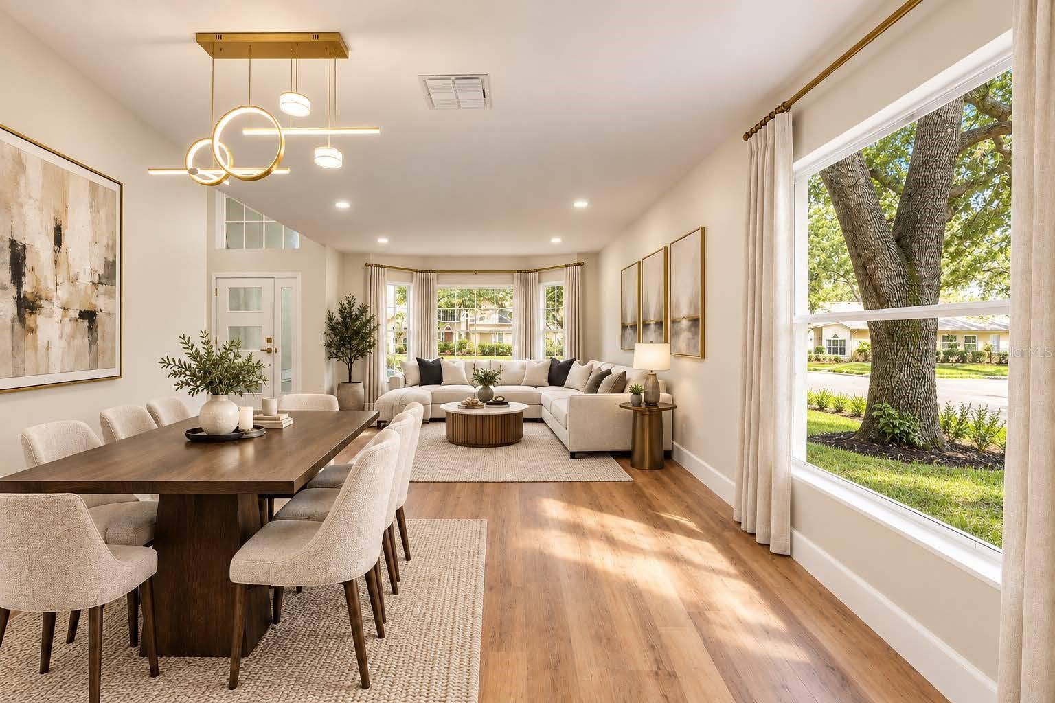13044 BELLERIVE LANE, Orlando, FL 32828 Staged to show Dining/ Living combo set up