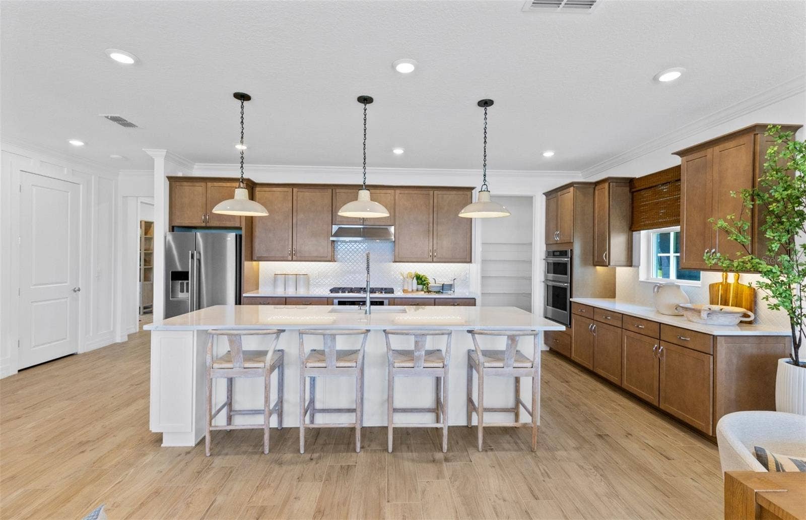 2579 CLEAR NIGHT AVENUE, Kissimmee, FL 34744 Model Home Design Only. Pictures and furnishings are for illustrative purposes only. Elevations, colors and options may vary. Furniture is for model home staging only.