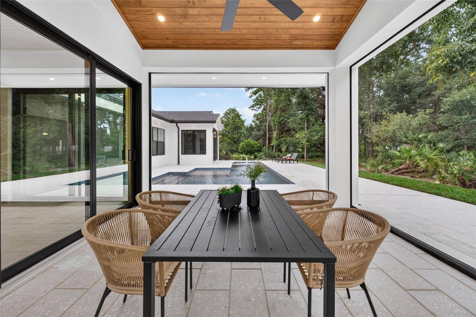 1815 WINDERMERE ROAD, Windermere, FL 34786 Covered lanai with motorized retractable screens