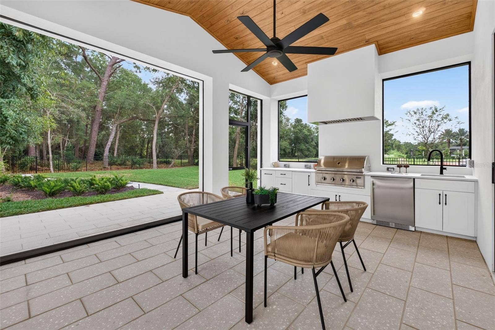1815 WINDERMERE ROAD, Windermere, FL 34786 Covered lanai with motorized retractable screens