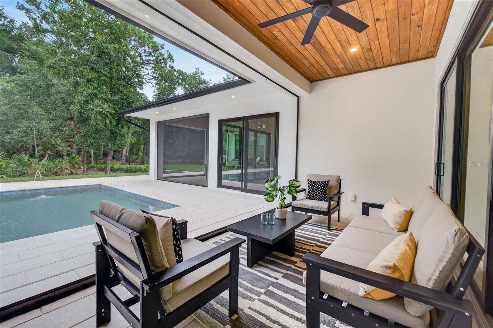 1815 WINDERMERE ROAD, Windermere, FL 34786 Covered porch with motorized retractable screens
