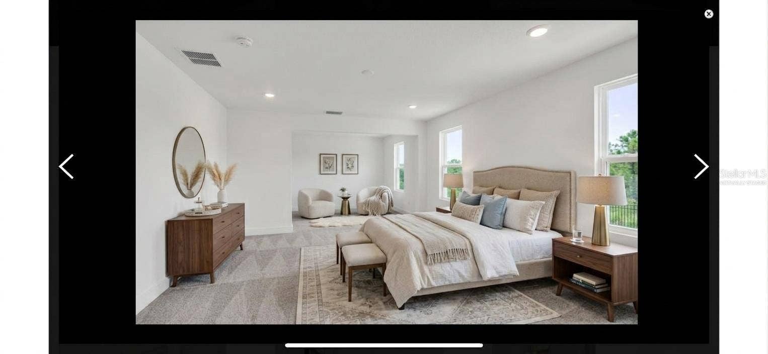368 LEMONGRASS ROAD, Minneola, FL 34715 Virtually Staged Primary Bedroom and sitting area