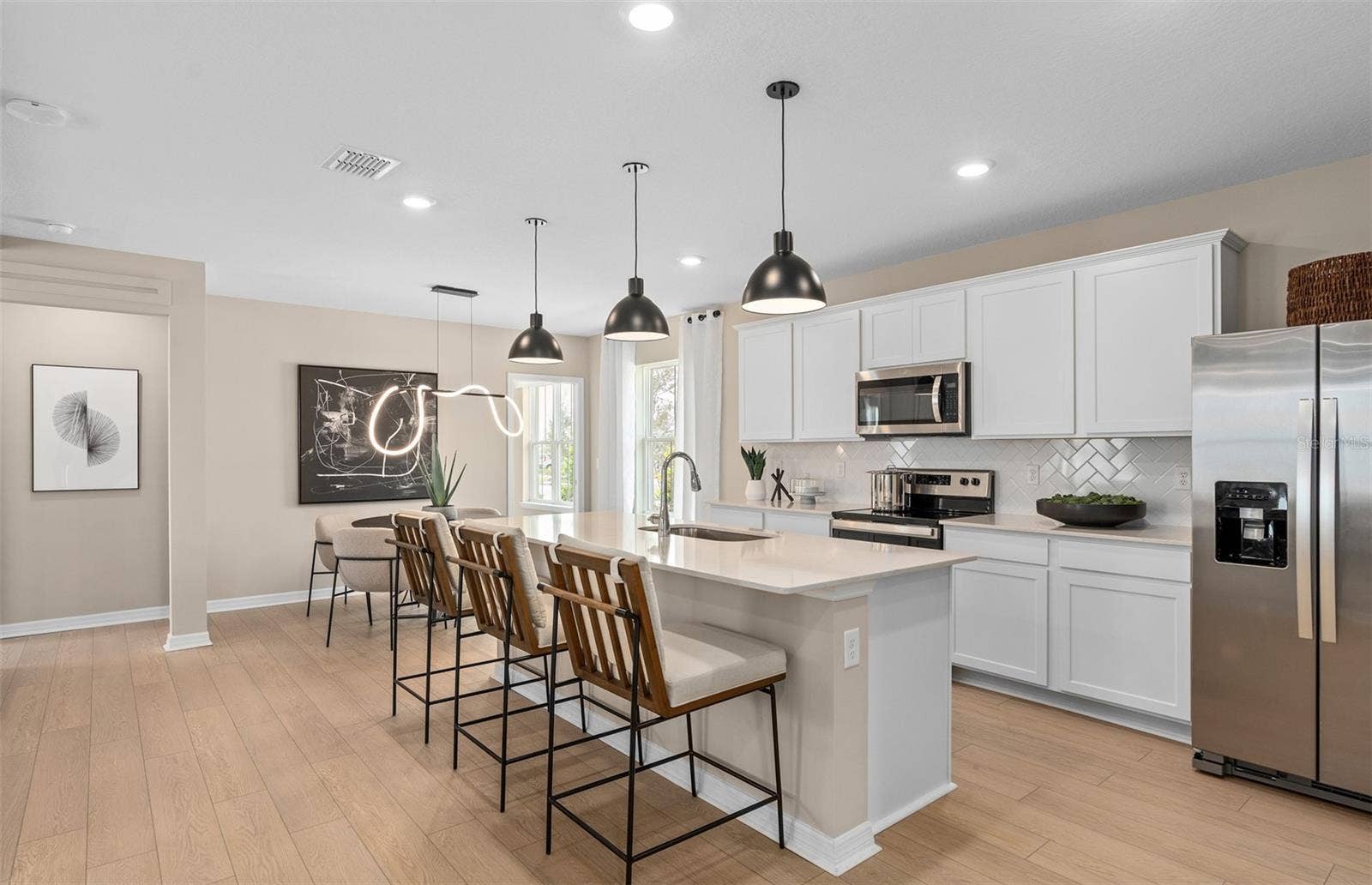 10969 HEATHER HAVEN STREET, Orlando, FL 32829 Model Home Design Only. Pictures and furnishings are for illustrative purposes only. Elevations, colors and options may vary. Furniture is for model home staging only.