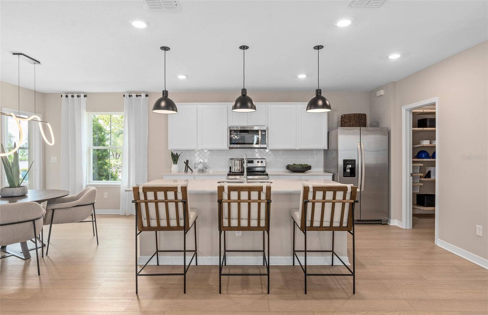 10969 HEATHER HAVEN STREET, Orlando, FL 32829 Model Home Design Only. Pictures and furnishings are for illustrative purposes only. Elevations, colors and options may vary. Furniture is for model home staging only.