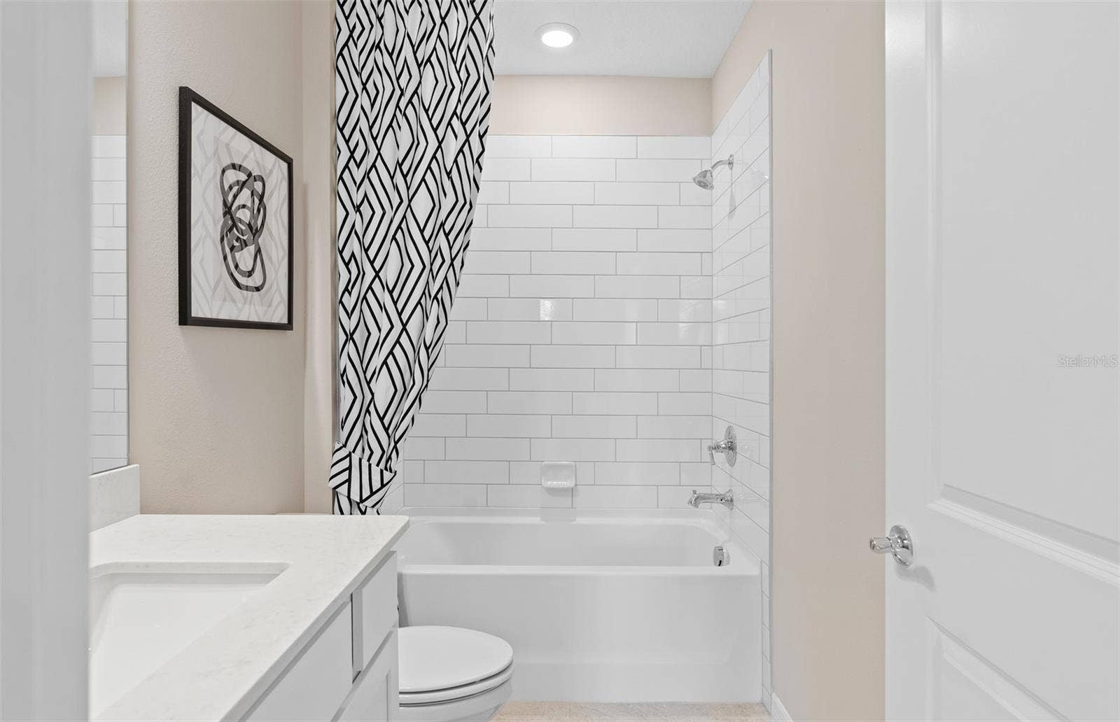 10969 HEATHER HAVEN STREET, Orlando, FL 32829 Model Home Design Only. Pictures and furnishings are for illustrative purposes only. Elevations, colors and options may vary. Furniture is for model home staging only.